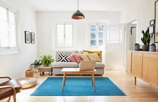 A warmly lit living room in a finished home