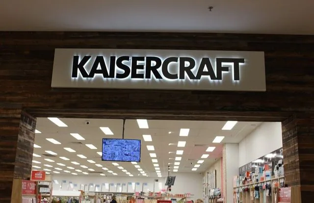 Kaisercraft shopfront with illuminated signage and store lighting installed by Flowsmart Electrical